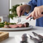 HENCKELS Juego de 4 cuchillos clásicos para carne, diseño alemán informado por más de 100 años de maestría, negro/acero