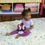 Bright Starts Disney Baby MINNIE MOUSE PeekABoo Centro de Actividades Saltador para Bebé con 8 Juguetes, Luces y Sonidos