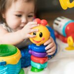 Baby Einstein Neighborhood Symphony Activity Centro de Actividades Saltador para Bebés, Entretenedor Infantil con Luces