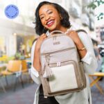 Itzy Ritzy - Mochila para pañales Boss Plus de gran capacidad con 19 bolsillos, cambiador, clips para carriola y correas