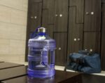 Botella de agua redonda de 1 galón y garrafón dispensador para refrigerador de 2 galones con llave New Wave Enviro libre