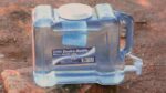 Botella de agua redonda de 1 galón y garrafón dispensador para refrigerador de 2 galones con llave New Wave Enviro libre