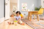 Lovevery | Kit de Juego The Babbler, Kit de Juego de Cumpleaños, Juguete Montessori para Niños Pequeños, 8 Productos de