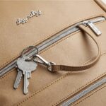 Itzy Ritzy Eras - Mochila para pañales de gran capacidad con diseño elegante, 15 bolsillos, cambiador, correas para carr