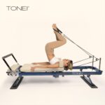 Tone Fitness Foldable Pilates Reformer – Portable Pilates Machine with Adjustable Resistance Bands, Smooth Glide Carriag
