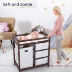GarveeHome Moderna mesa cambiadora para bebé con cesta de lavandería y 3 cajones, cómoda de madera maciza para cuarto de