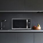Farberware Classic FMO11AHTBKD horno de microondas de 1.1 pie cúbico y 1000 W, Acero inoxidable