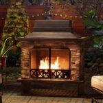 Chimenea para Exteriores Sunjoy Gwendolyn Acero Negro con Piedra Manufacturada Rejilla Removible y Atizador