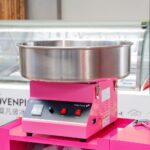 Máquina de Algodón de Azúcar Restaurantware RWT1009P Acero Inoxidable 21 Pulgadas Rosa 1080W