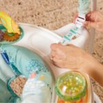Saltador de Actividad Infantino Magic Motion 203144-00 Tema Oceano Asiento Giratorio 360 Grados Altura Ajustable