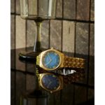 Reloj Citizen Mujer Eco-Drive EM1142-84L Acero Inoxidable Tono Dorado Esfera Azul 33mm