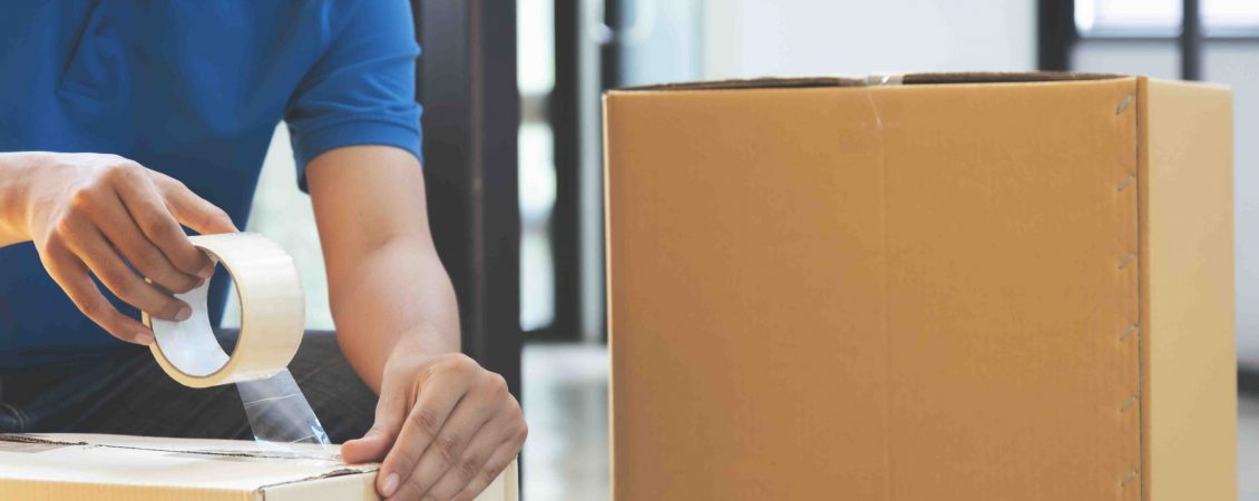 small-online-business-owner-packing-in-the-cardbox small-online-business-owner-packing-in-the-cardbox